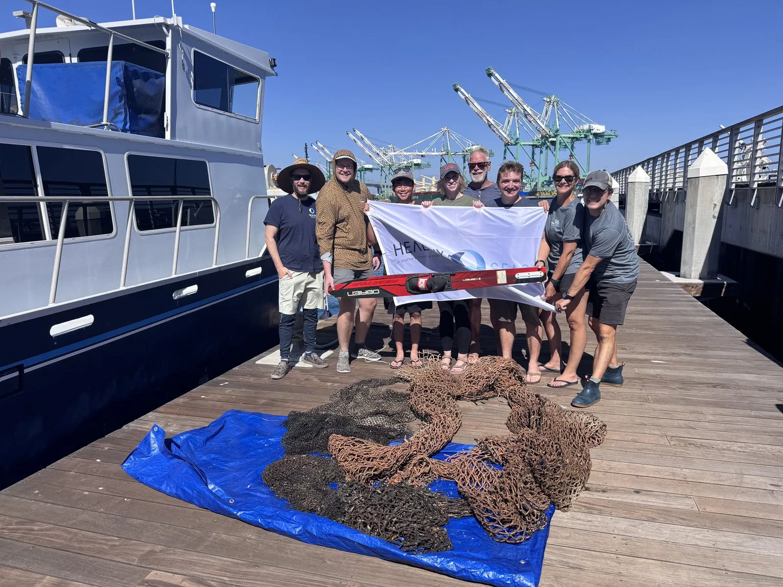 The team with the day's haul back at the dock.